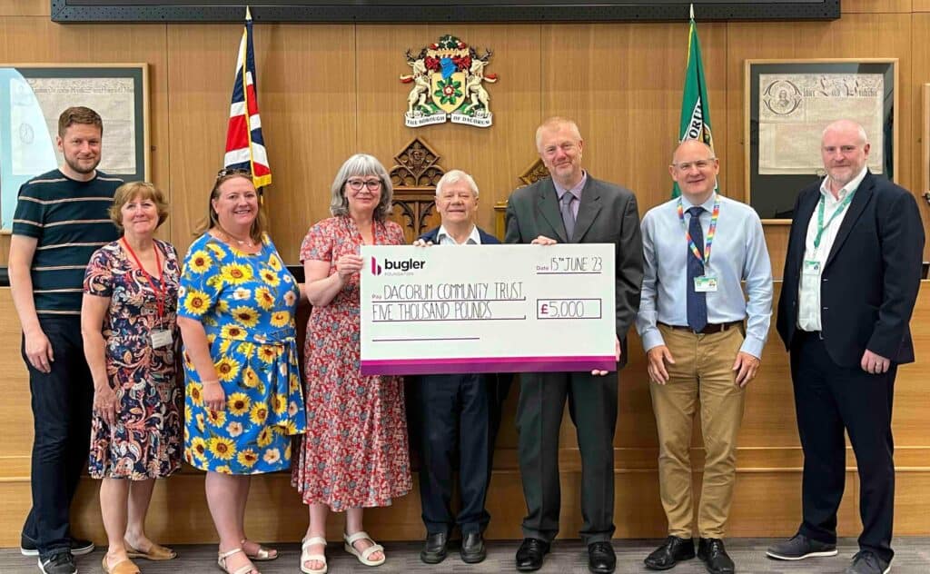 A photograph of our Chairman, Tony Williams, as well as Trustees Paul Thomas and Claire Furnell-Williams, alongside our Trust Manager, Dena Tyler MBE and Finance Officer, Rosemary Hall, attending the presentation at The Forum in Hemel Hempstead.